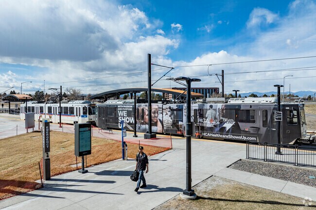 Snag a lightrail ride In the inviting and quiet Horseshoe Park, Aurora, Colorado.