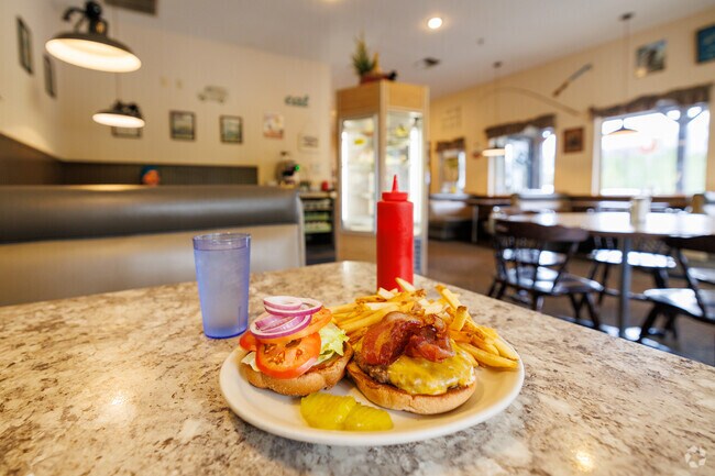Locals visit the Mountain View Diner for classic diner cuisine and a cozy atmosphere.