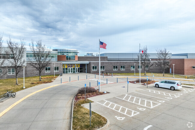 The modern building and entryway of South Middle School are welcoming and unique.