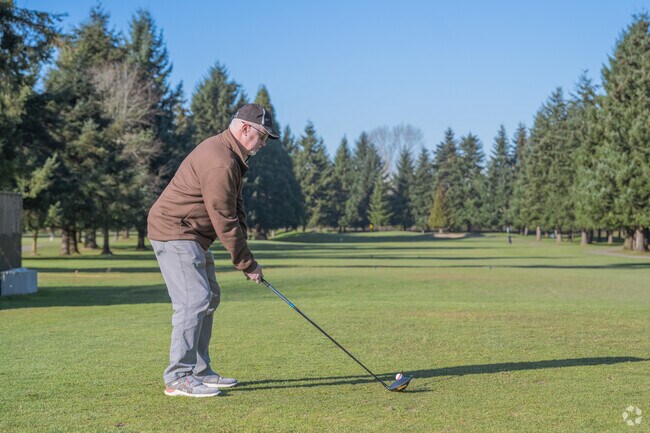 Take a half day to play a round at the River Bend golf course.