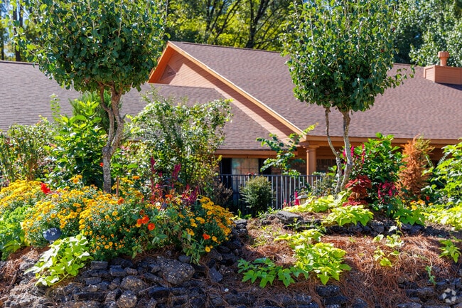 Many Pines Road residents take pride in their lush, well-maintained yards.