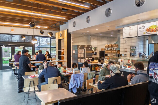 Wood Village offers a variety of chain restaurants, including Chipotle and other popular options.