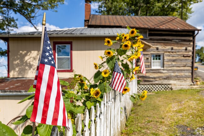 White picket fences and beautiful flowers are very common in Carroll Township.