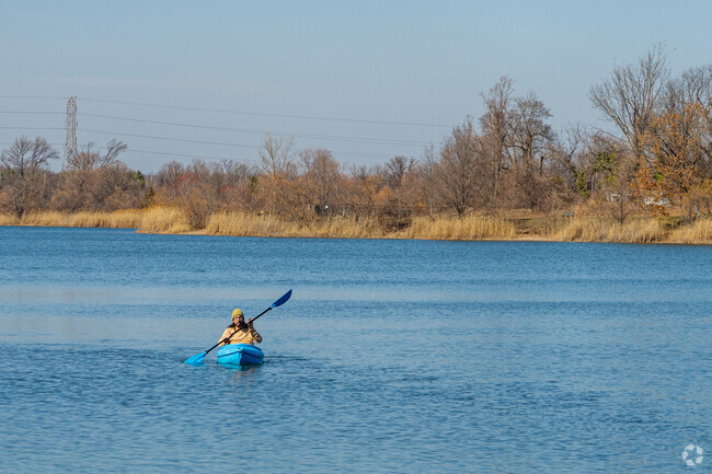Kayakers take full advantage of the lake on a nice day at Falls Township Community Park.