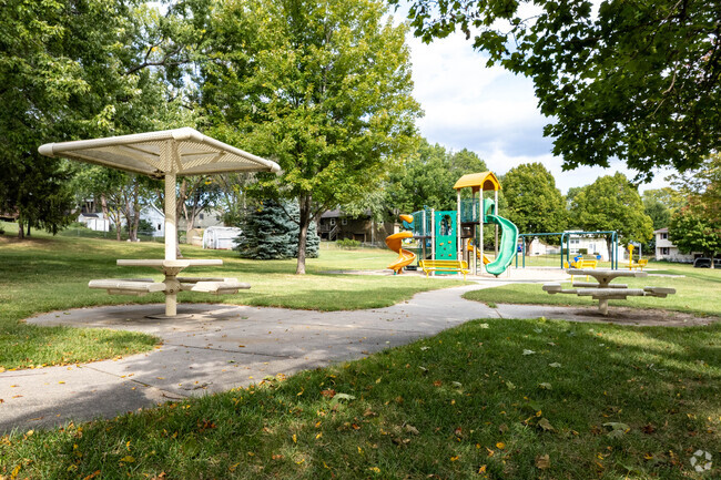 North Oaks Park has shaded picnic tables and playground equipment for the kids.