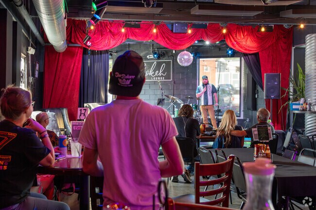 Enjoy live entertainment, tasty drinks, and great food at Bokeh Lounge near University South.