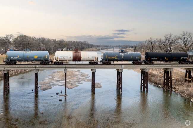 The train bridge along the Lincoln Street Bridge is a beautiful scene in South Central.