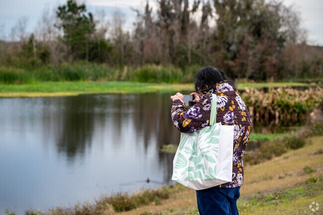 Sugarhill locals enjoy the weekly Wednesday Bird Walk at the Wetlands event.