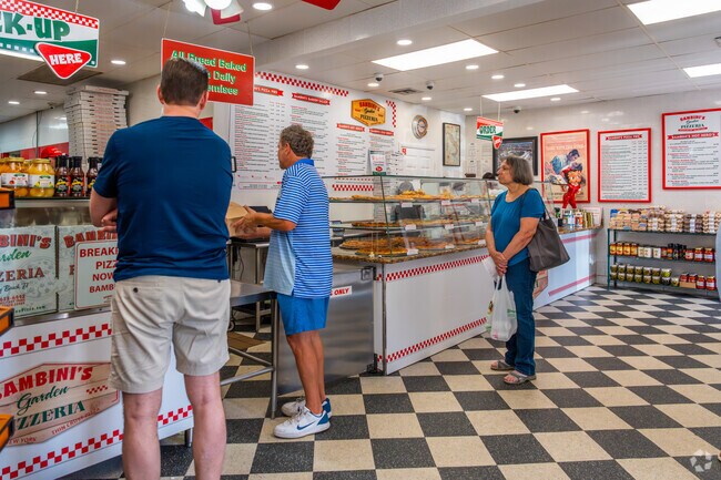 Bambini's Pizzeria Garden near The Hamlet offers pizza by the slice, calzones and gyros.
