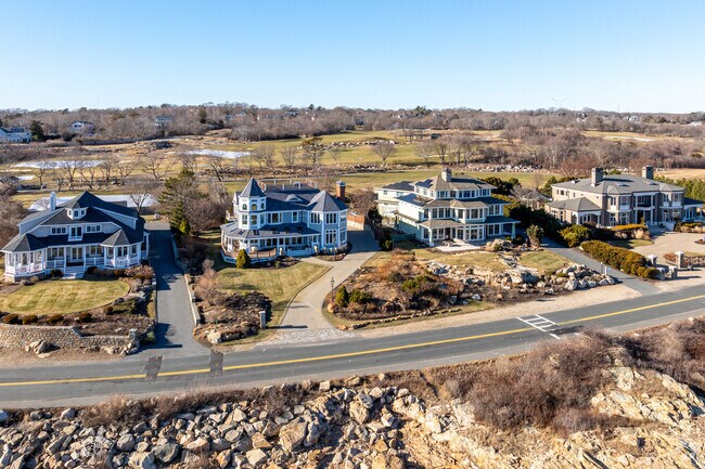 An aerial of East Gloucester homes with the Bass Rocks Golf Course in the background.