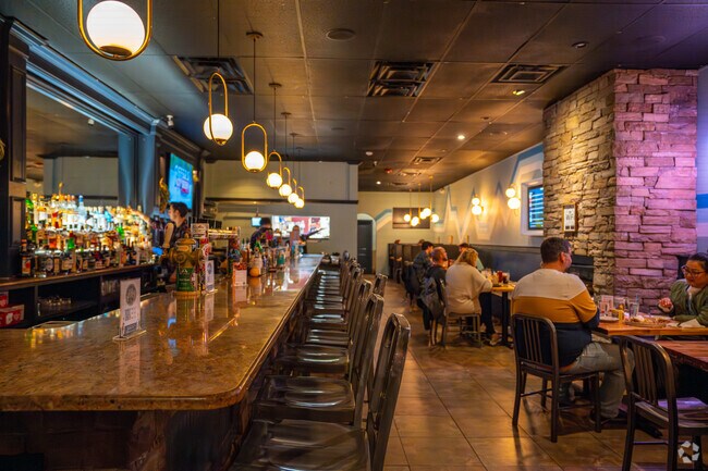 Sit at the bar, get a booth, or grab a table at Mystic Station near Edgeworth.