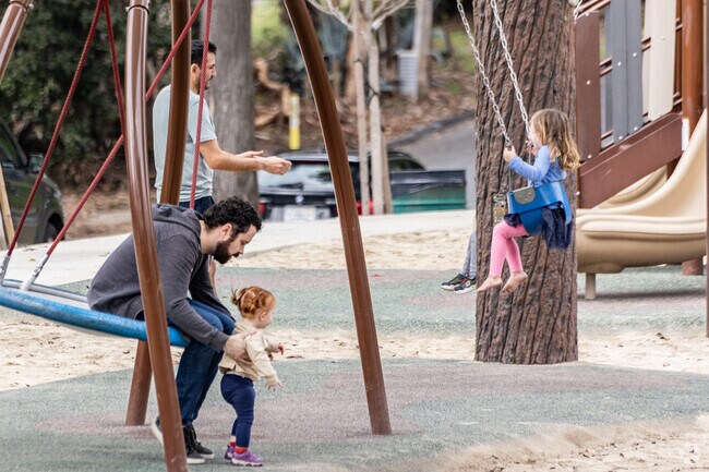 The wood themed playground at Los Cerritos Park is fun for everyone.