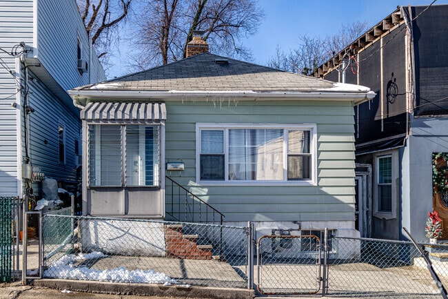 Minimal Traditional homes in Glenwood offer simple yet classic suburban living spaces.