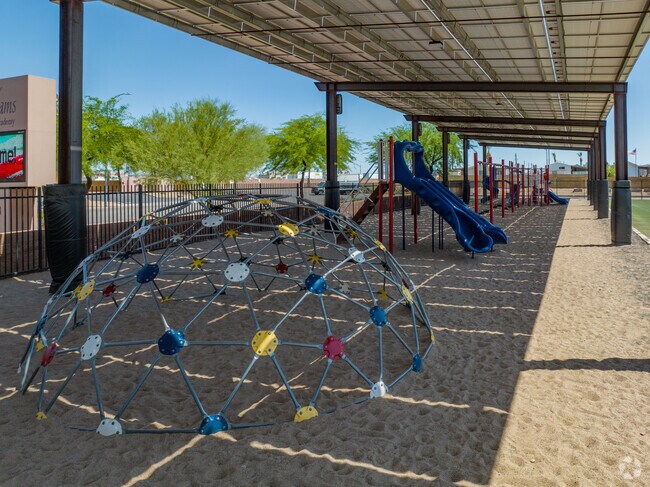 Adams Traditional Academy has a few playgrounds on its campus.
