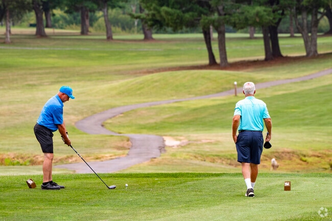 There are many golf courses around New Post for a day of recreation with friends.