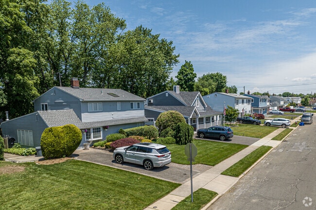 Additions have changed the footprint and styles of many original Levittown Cape Cods.