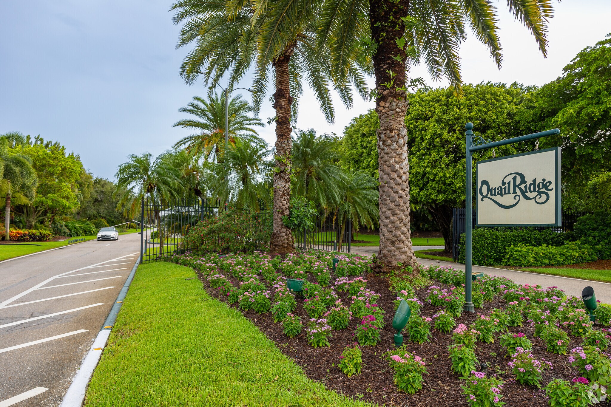 The Quail Ridge neighborhood sign welcomes locals into the gated community.