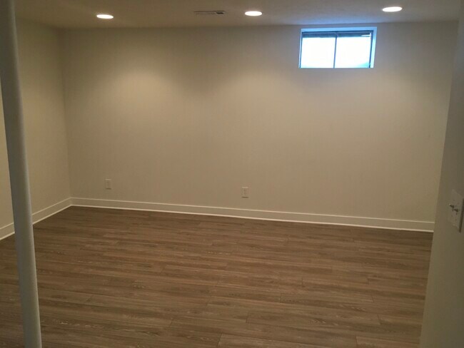 New vynl quality tile that was just installed this month in the finished basement’s: main room, secondary room & bathroom.