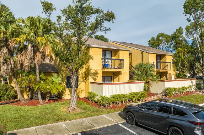 The Village Creek Townhomes is surrounded by lush greenery.