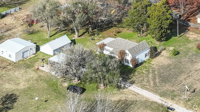 Move your family to Needmore and spread out, there is plenty of room.