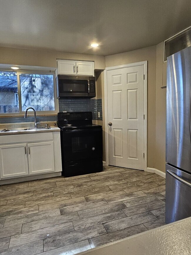 1371 Xanadu St, Aurora, CO 80011 - photo 4