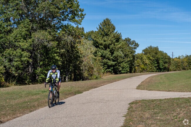 Bikers love the convenient access to the Chippewa River State Trail from Lake Hallie.