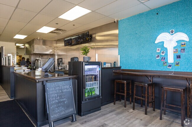 Inside counter of Irie Kitchen with neon decoration