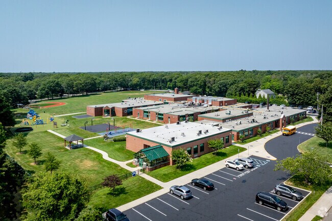 There is a basketball court and shaded picnic area at East Quogue Elementary School.