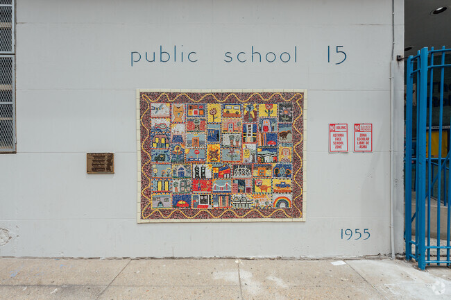 The mosaic outside the schools entrance was done by students in 2000 in Alphabet City.