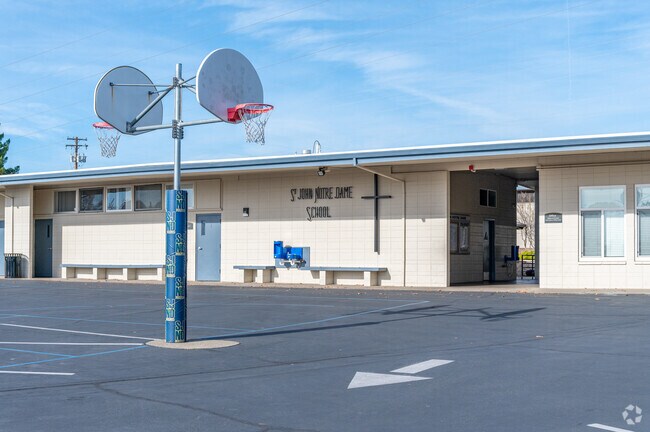 Play basketball at St. John Notre Dame School.