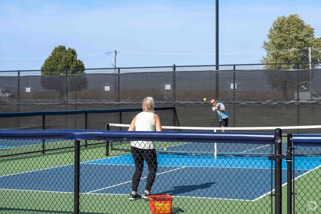 Hassert Park has some nice pickle ball courts for people to have fun with their friends.