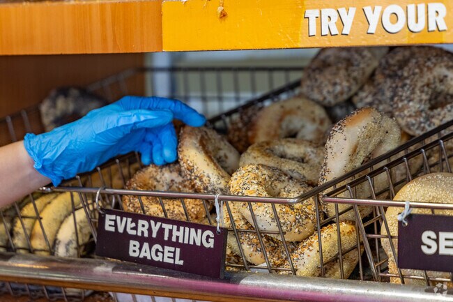 Start your morning with a bagel and coffee at the beloved Big Apple Bagels in Fruit Hill