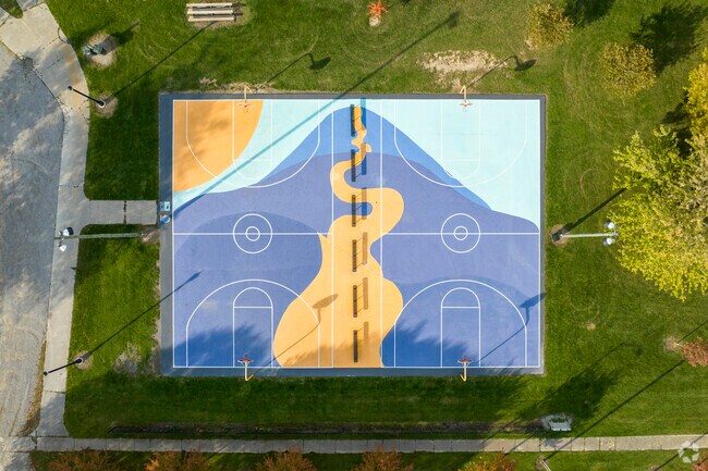 Shoot some hoops in Ivan Lebamoff Reservoir Park in La Rez.