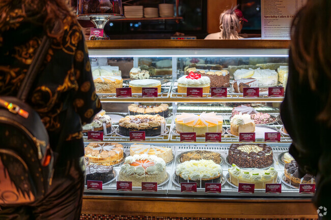 Indulge in sweet delights at Cheesecake Factory, just minutes from Smith Hill in Providence.