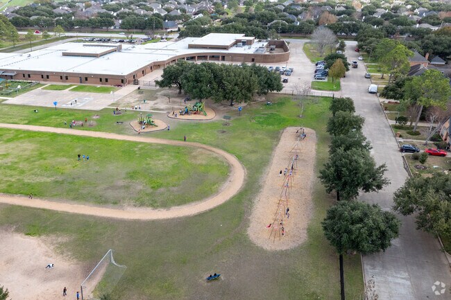 Playful laughter echoes as students enjoy a vibrant recess at Owens Elementary School.