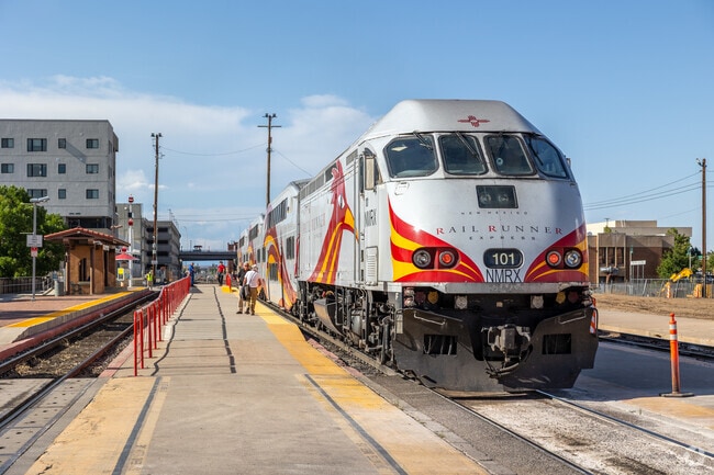 The Rail Runner Express pulls into downtown, linking Silver Hill to regional travel.