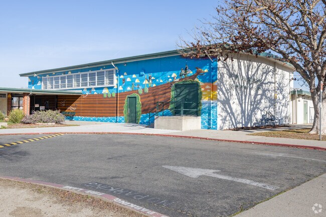 There are 311 students enrolled at H. W. Harkness Elementary School.