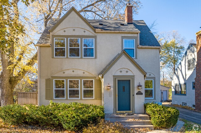 Here is a classic two-story stucco home in the Todd Park neighborhood.