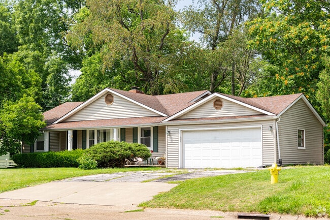 Central Rock Island has many single-story ranch homes with manicured lawns.