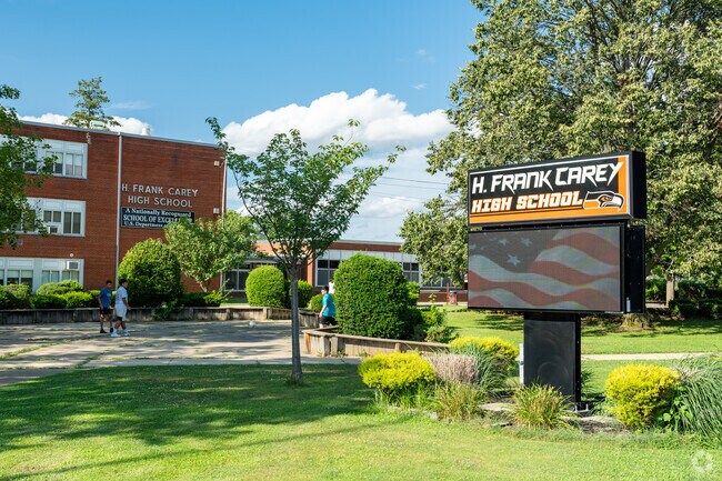 The main entrance to H. Frank Carey High School is located on Poppy Ave.