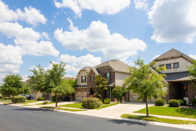 A row of newly developed national and traditional brick homes in Serenada.