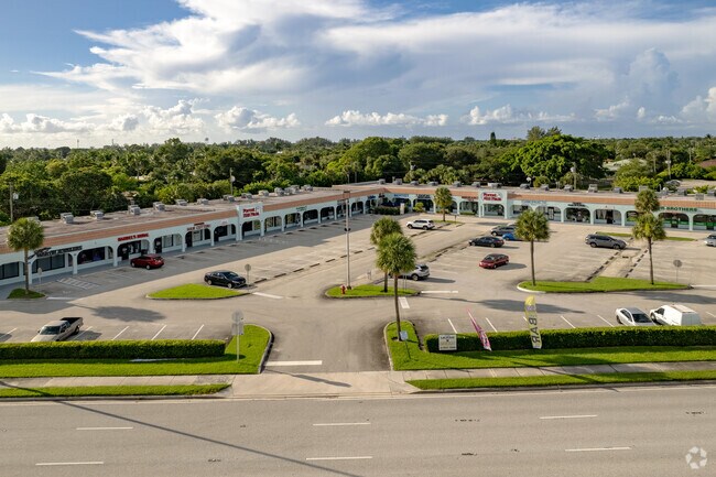 Shopping and food options at Forest Hill Shopping Center in Lake Clarke Shores, FL.