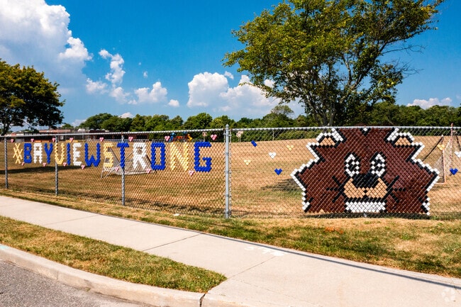 Bayview Strong and their mascot featured on the fence here at Bayview Elementary School.