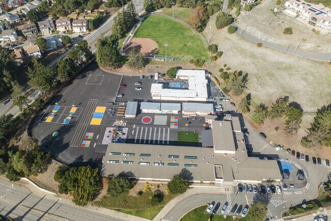 Munck Elementary School - has a snice play yard and access to the green space behind.