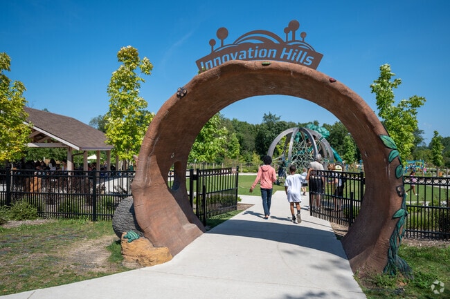 Kids enter Innovation Hills in Rochester Hills to explore the fun.