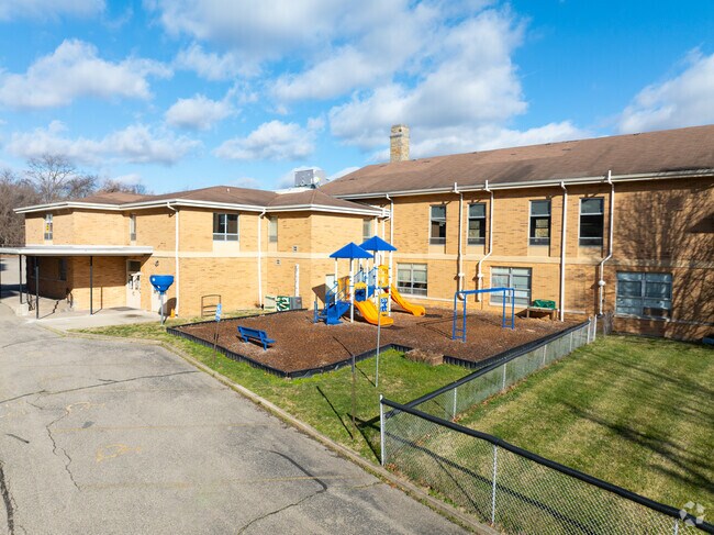 The students enjoy playing on the playground for recess.