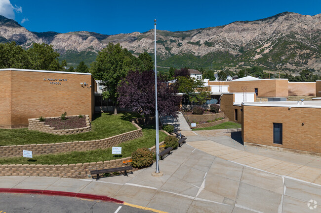 Tiers of landscaping beautiful the entrance of Bates Elementary School.