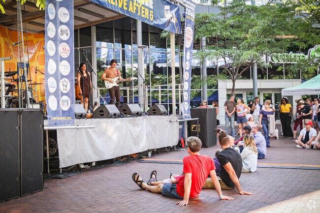 Residents relax to the easy tunes of Afrosonic at Alive After 5 in downtown Boise.