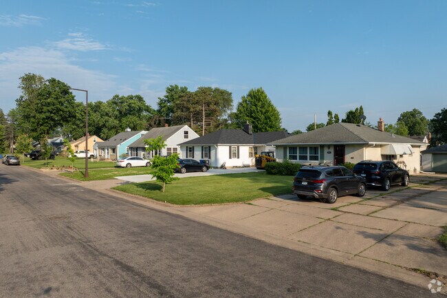 Lincoln Park Cape Cod homes offer large driveways.