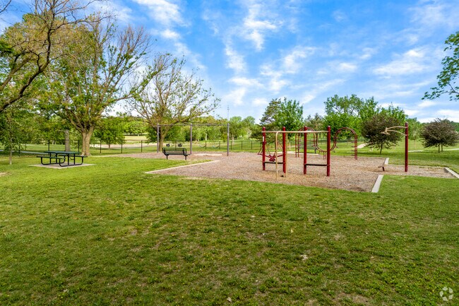 Kids can enjoy the playground and open space at MacDonald Park.